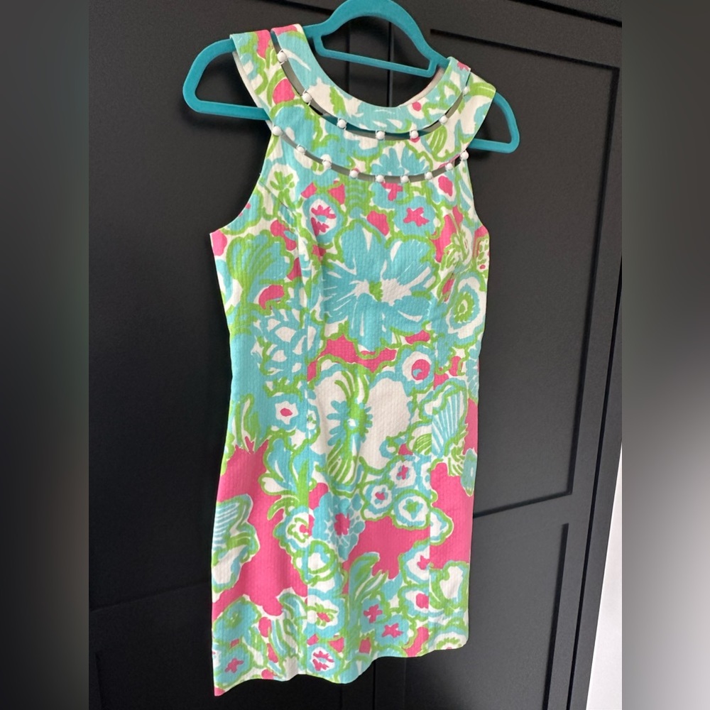 Unique round neck lily dress with bead accent